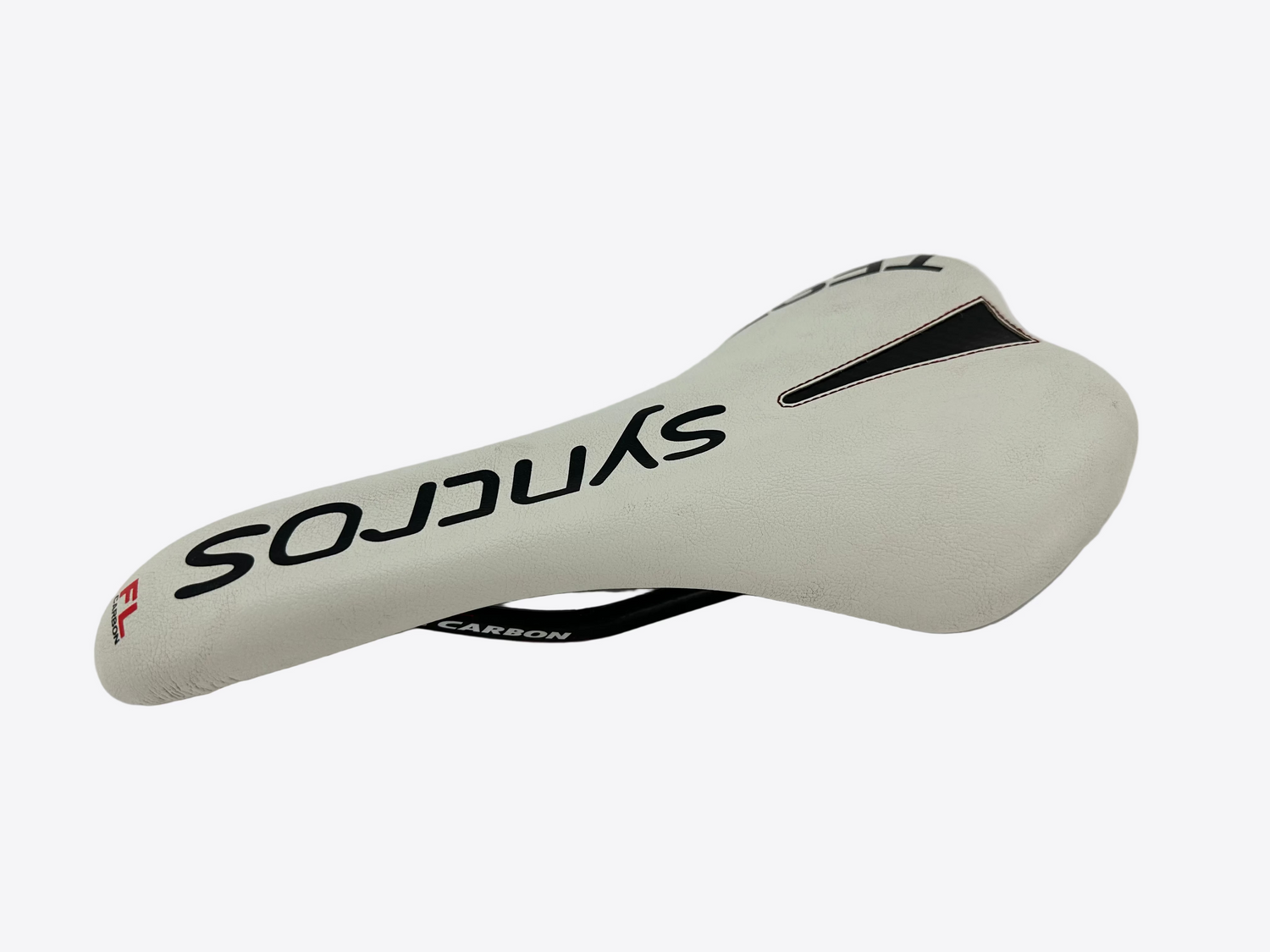 White bicycle saddle with 'SYNCO' branding on a white background