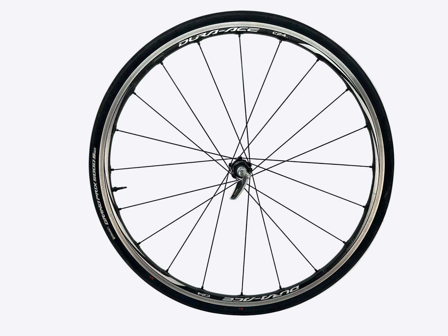 Bicycle wheel with Shimano Dura-Ace branding on a white background