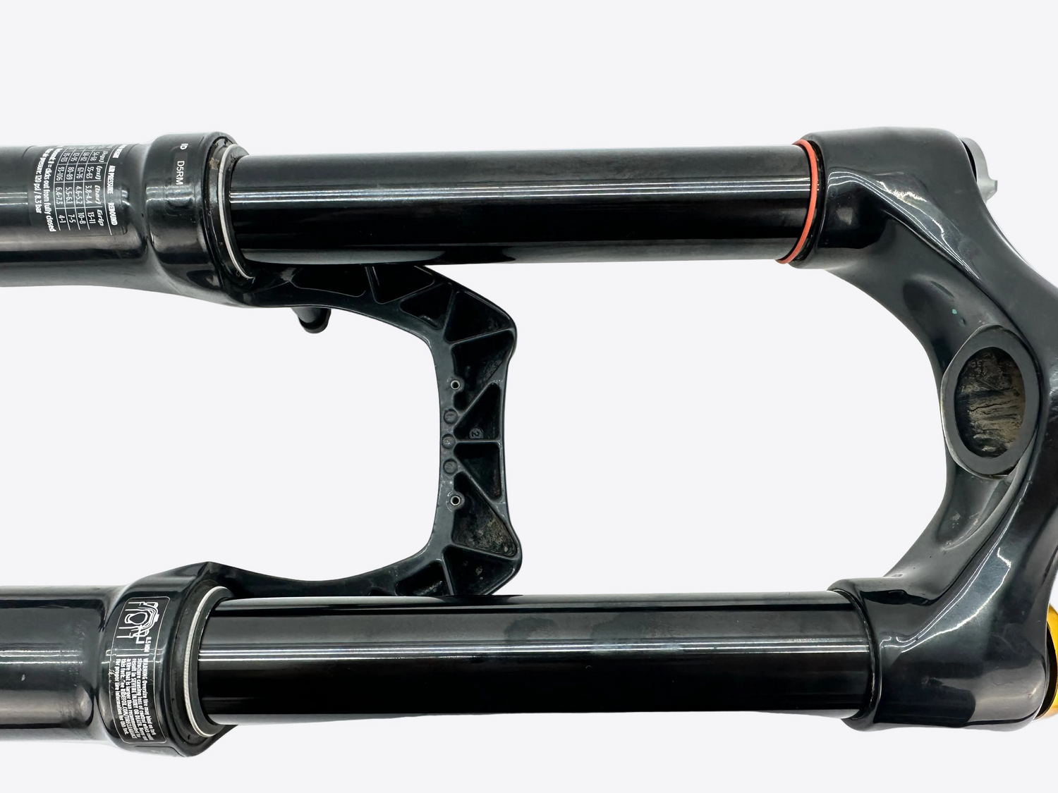 Close-up of a black bicycle fork on a white background