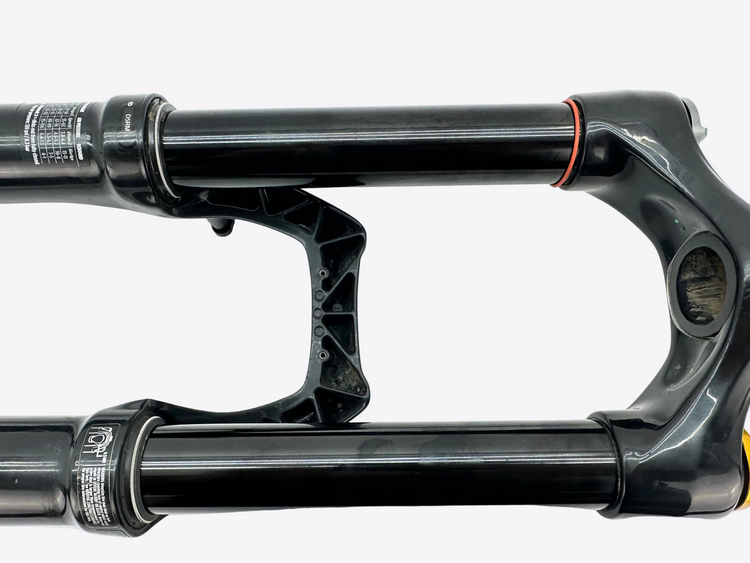 Close-up of a black bicycle fork on a white background