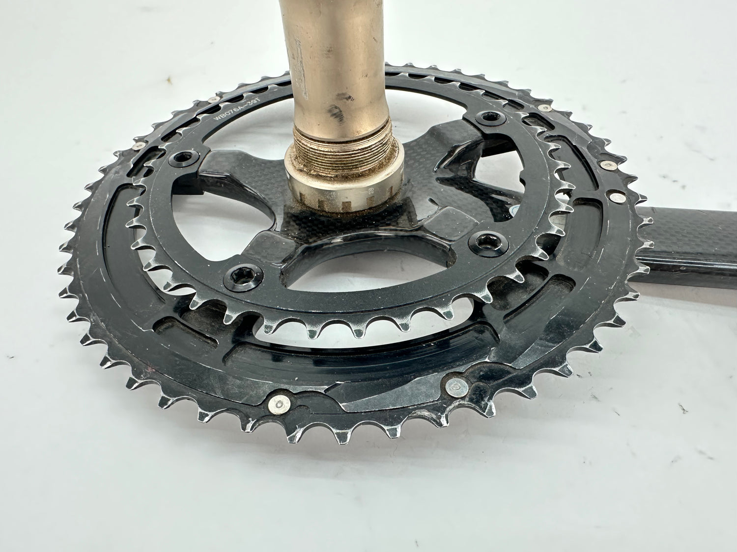 Bicycle crankset with chainring on a white background