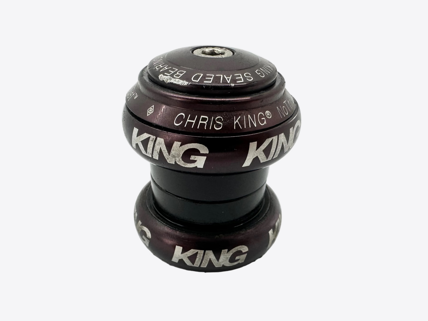 Chris King bicycle headset on a white background