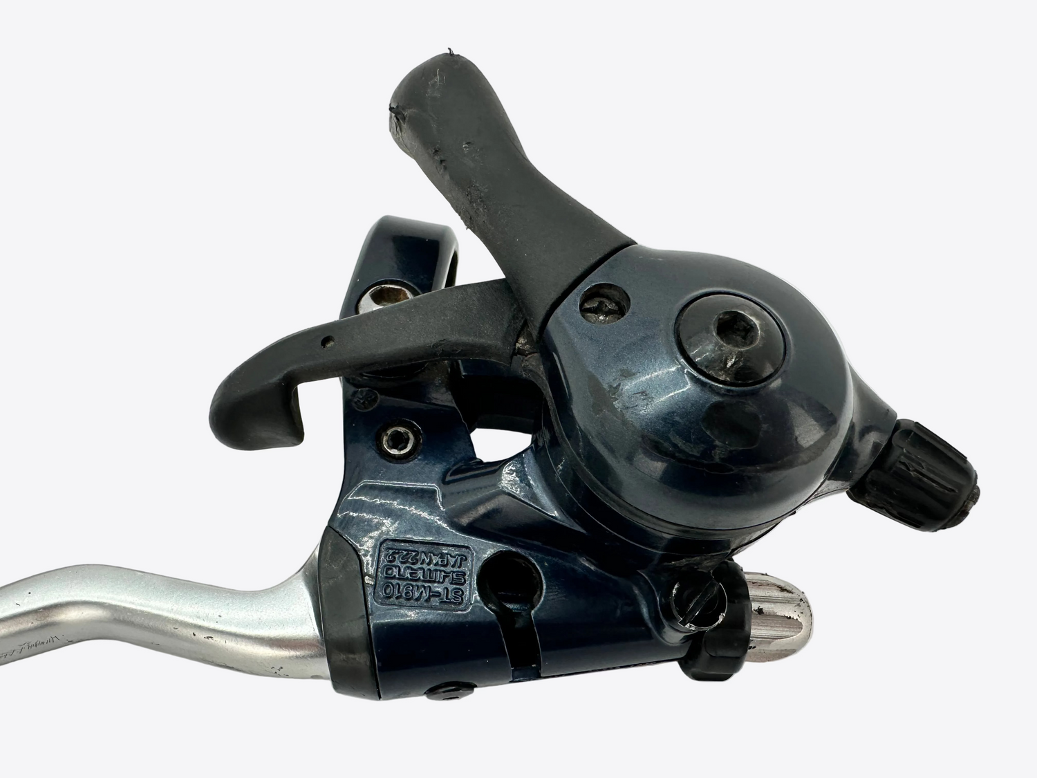 Close-up of a black bicycle brake lever on a white background
