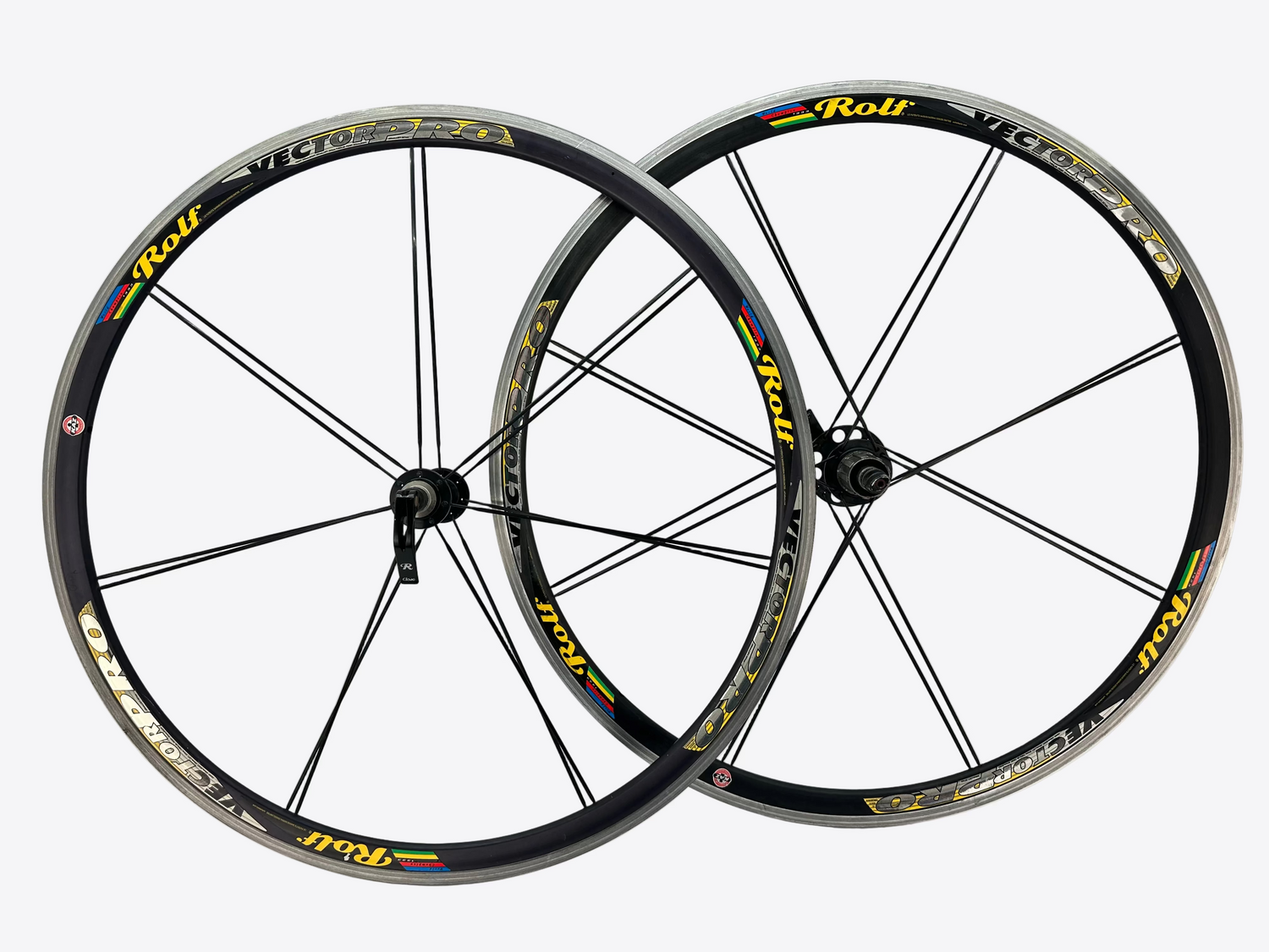 Two bicycle wheels with 'Rolf' branding on a white background