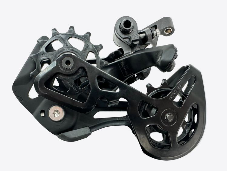 Black mechanical component on a white background