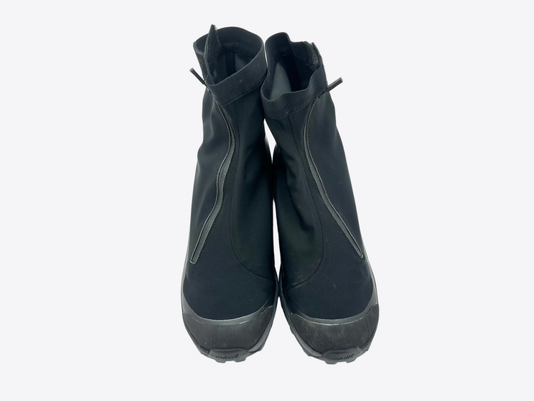 Pair of black boots on a white background