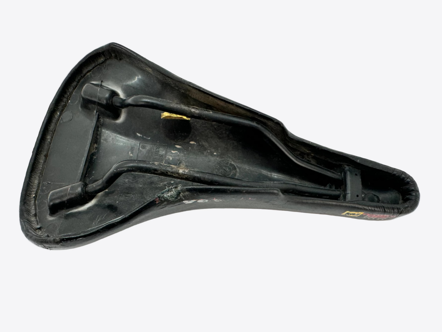 Black bicycle saddle on a white background