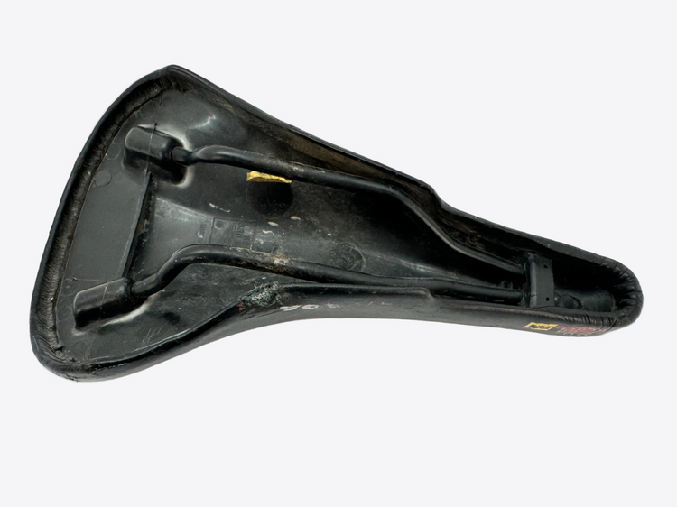 Black bicycle saddle on a white background