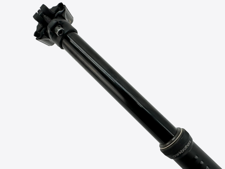 Black bicycle suspension fork on a white background