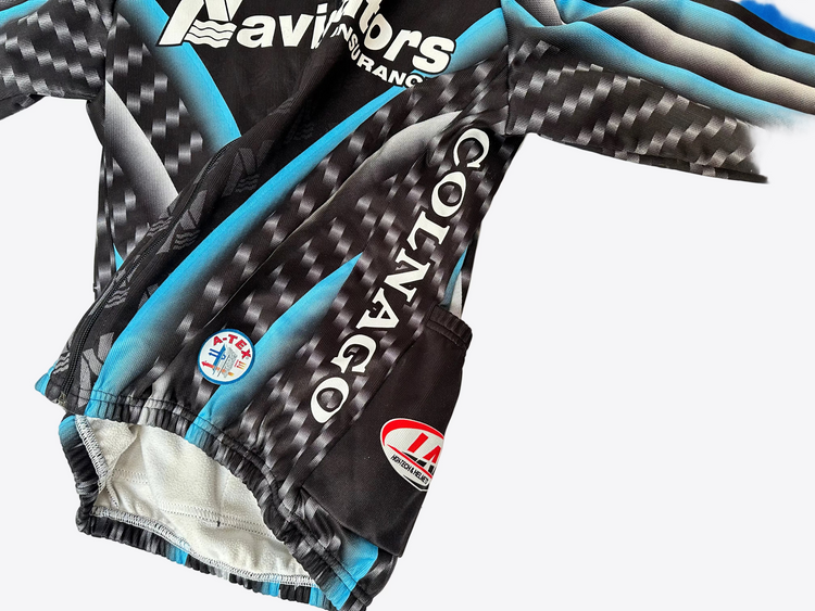Pair of black and gray cycling shorts with visible branding on a white background