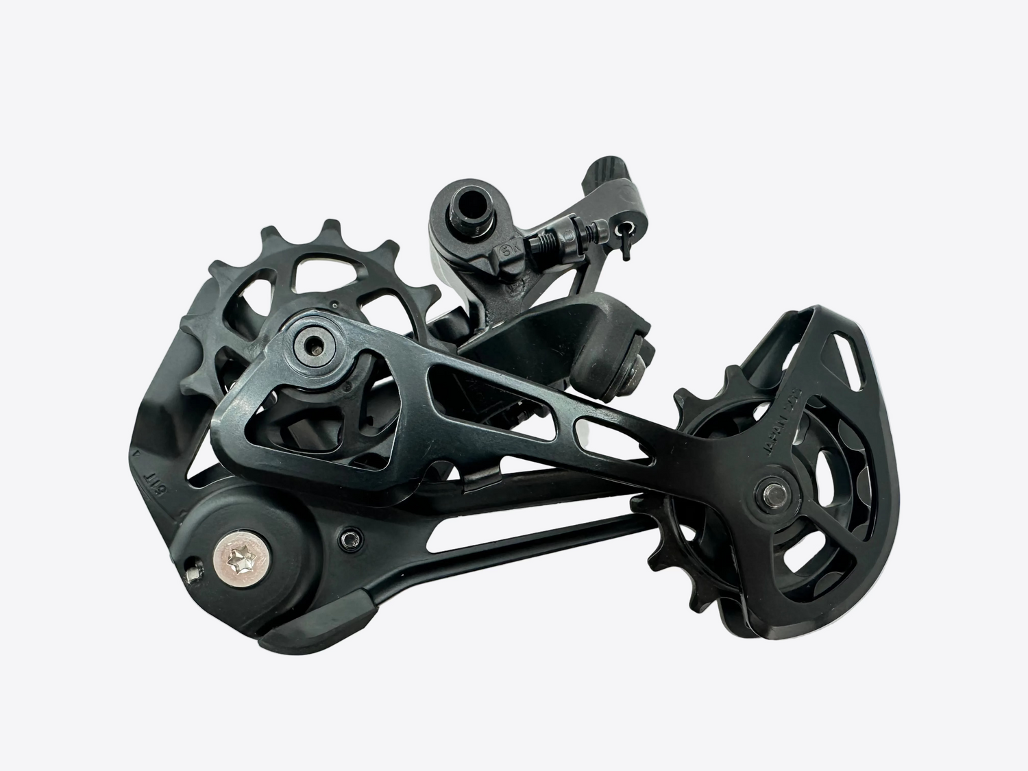 A black Shimano bicycle rear derailleur photographed on a plain white surface.