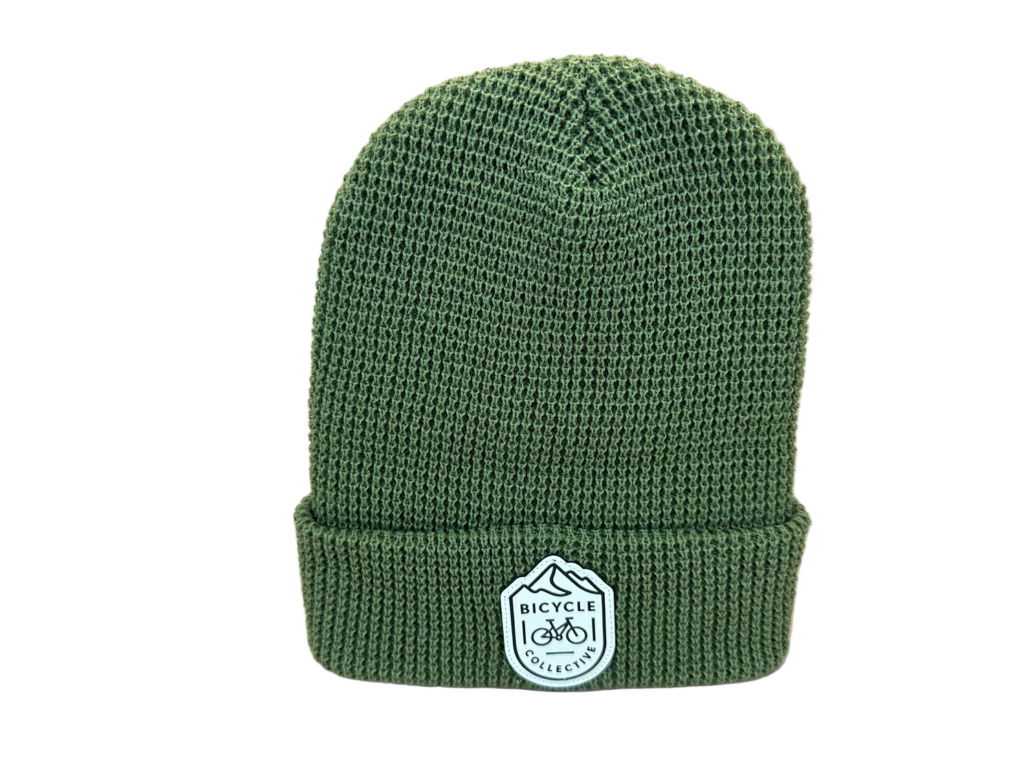 Green knit beanie with a logo on a white background