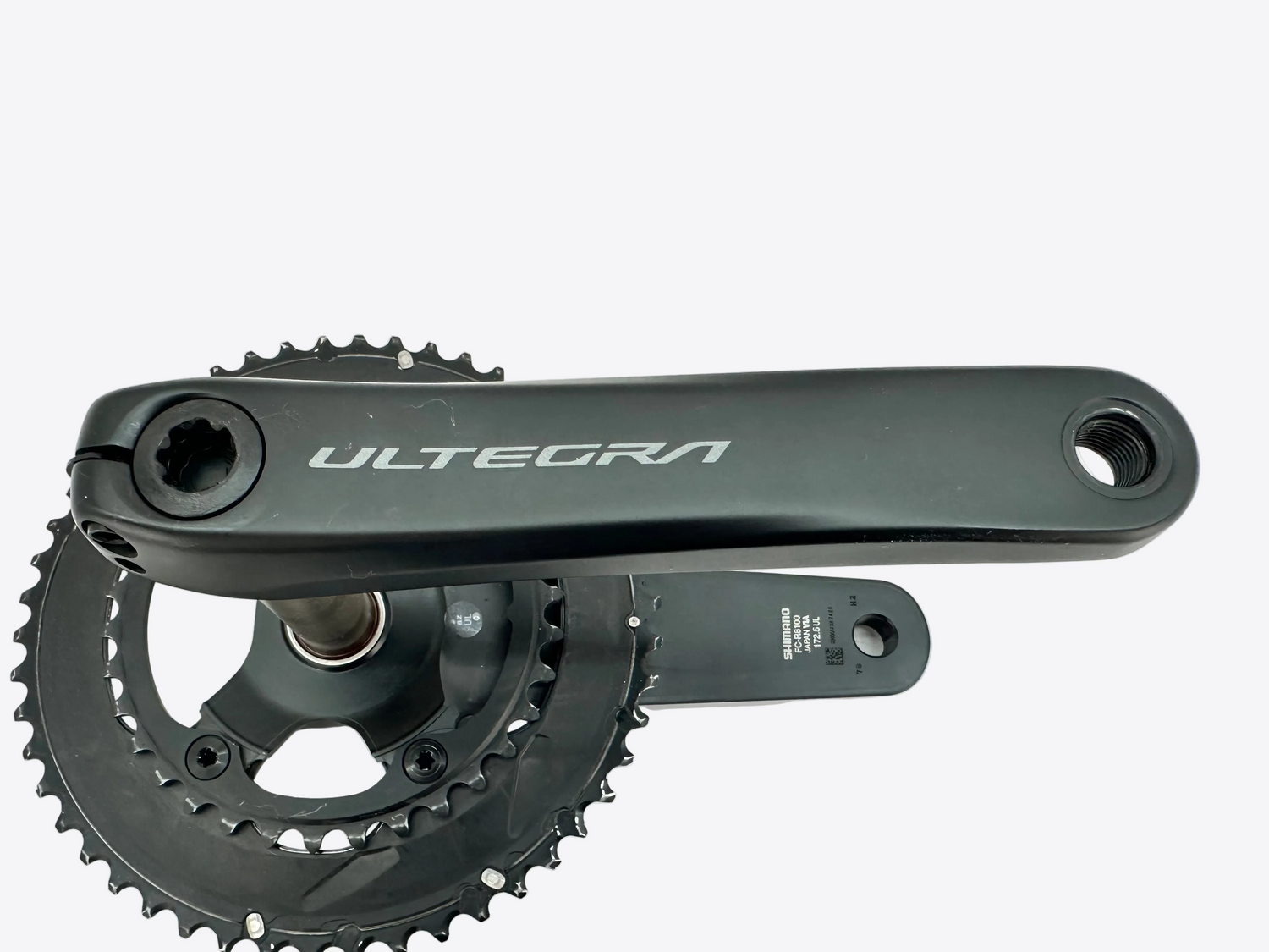 Bicycle crankset with Ultegra branding on a white background