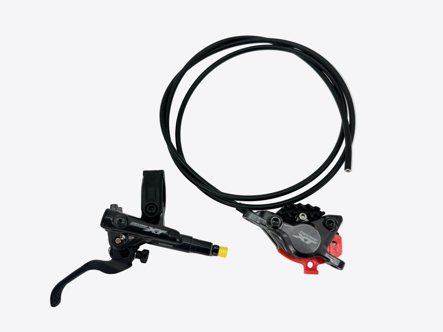 Bicycle brake lever and caliper assembly on a white background
