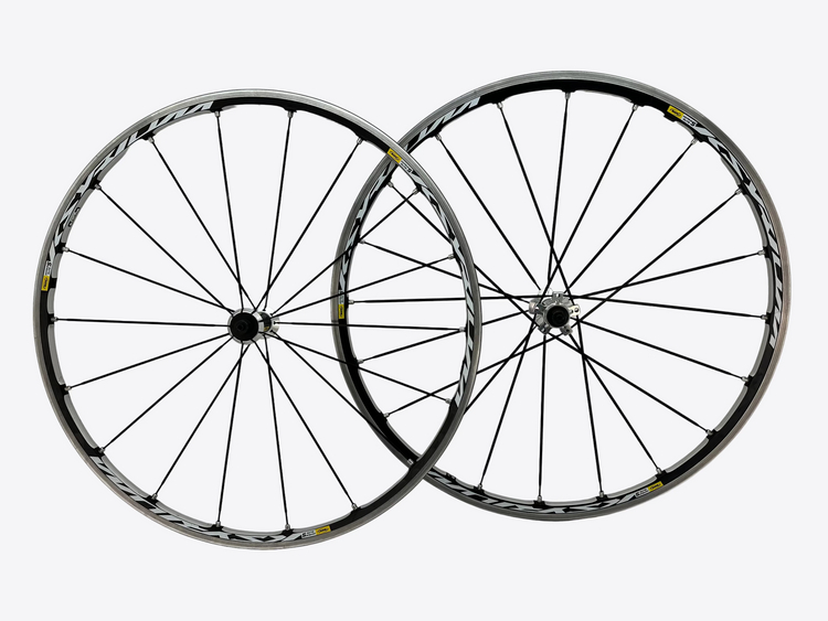 Two bicycle wheels with black spokes on a white background