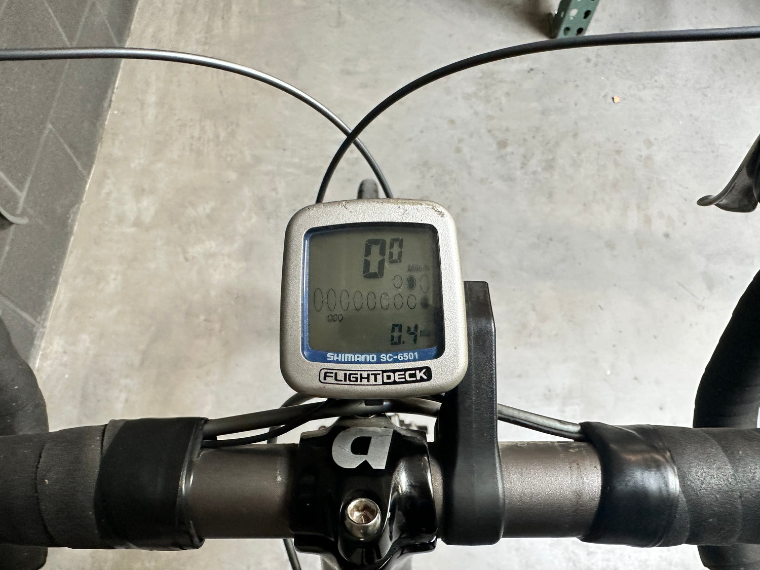 Bicycle computer on handlebars with a blurred background