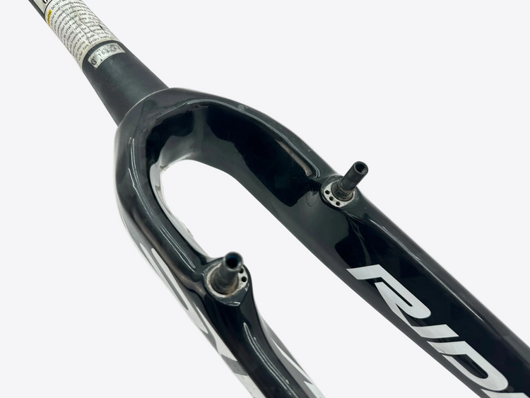 Close-up of a black bicycle fork with 'Ridley' branding on a white background
