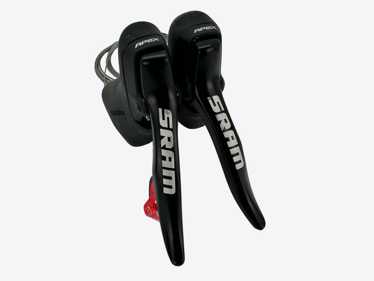 Black Sram bicycle shifters on a white background