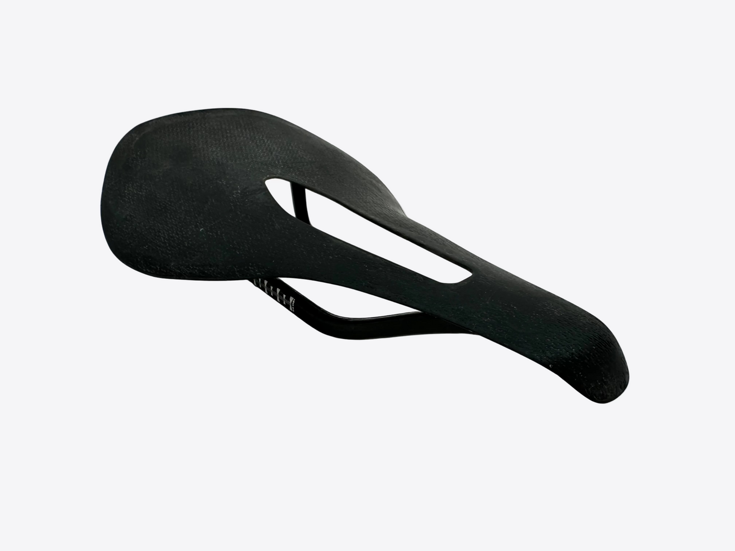 Black bicycle saddle on a white background