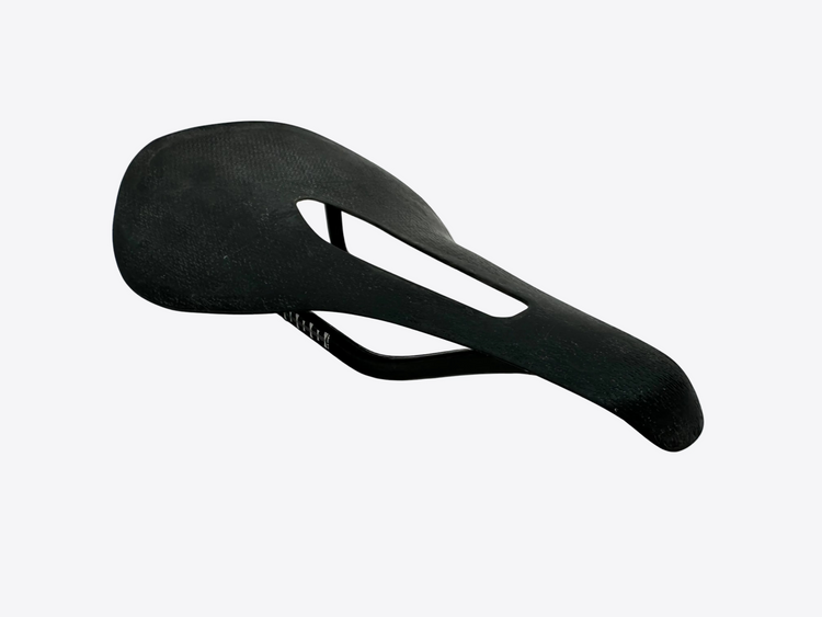 Black bicycle saddle on a white background