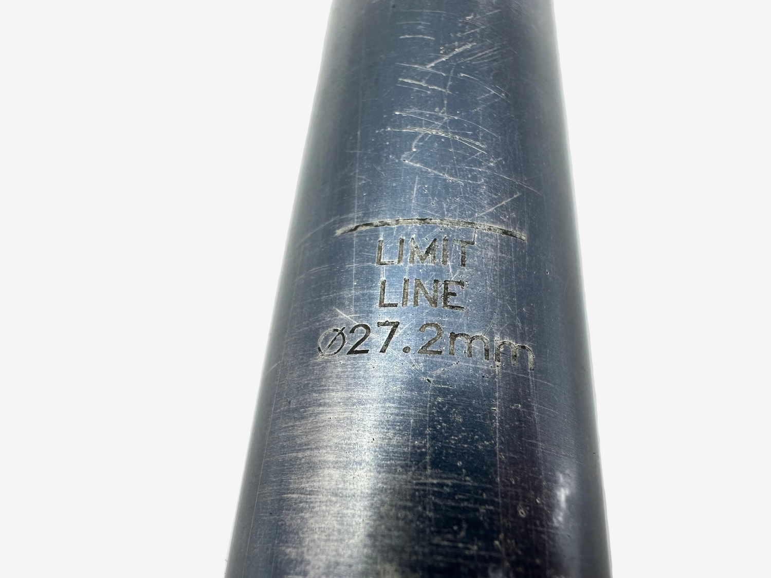 Metal tube with 'LIMIT LINE 027.2mm' marking on a light gray background