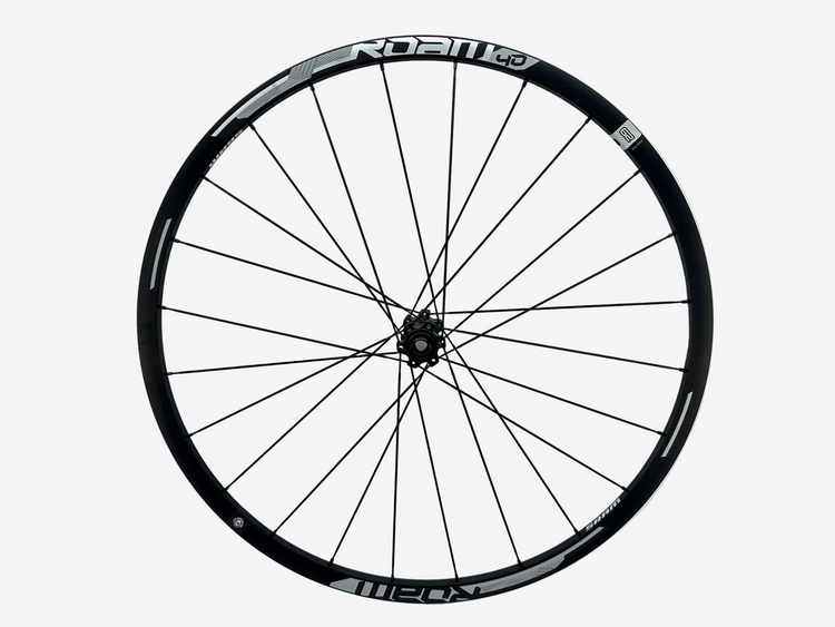 Bicycle wheel with black rim and white background