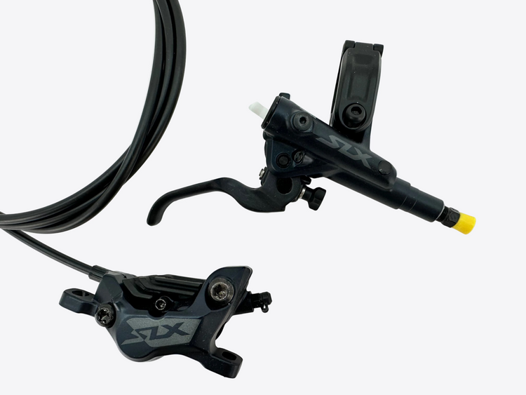 Bicycle brake lever and caliper on a white background