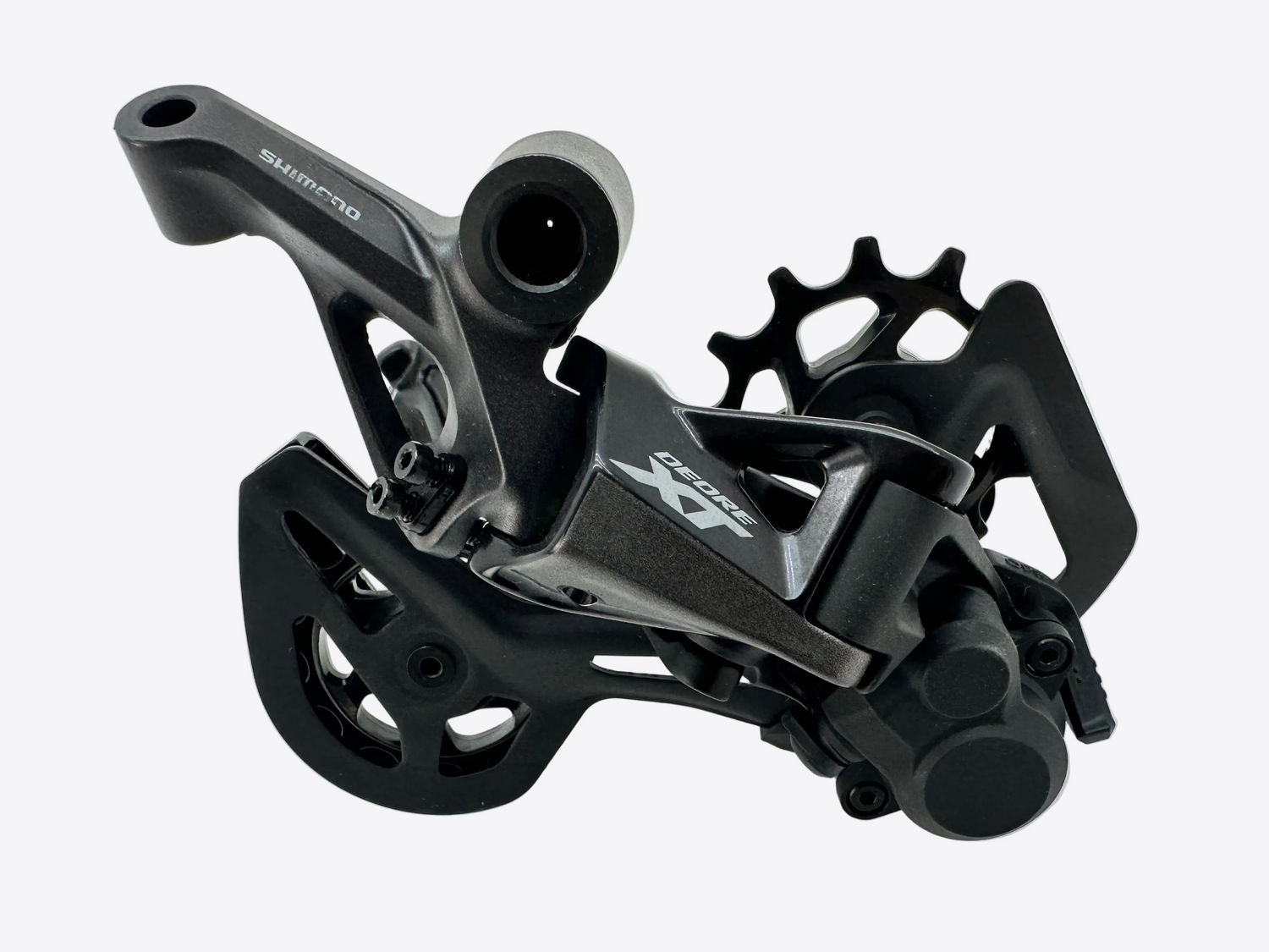 Black bicycle gear mechanism on a white background