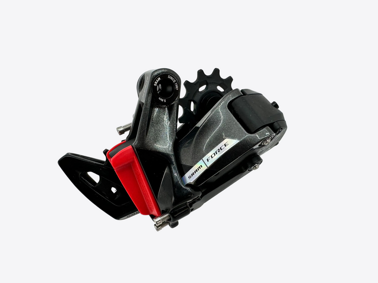 Bicycle derailleur with 'Sram Force' branding on a light gray background