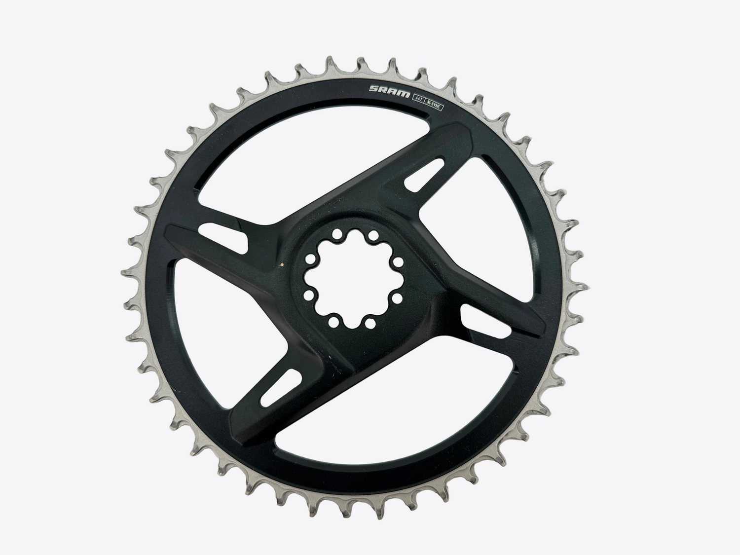 Black bicycle sprocket on a white background