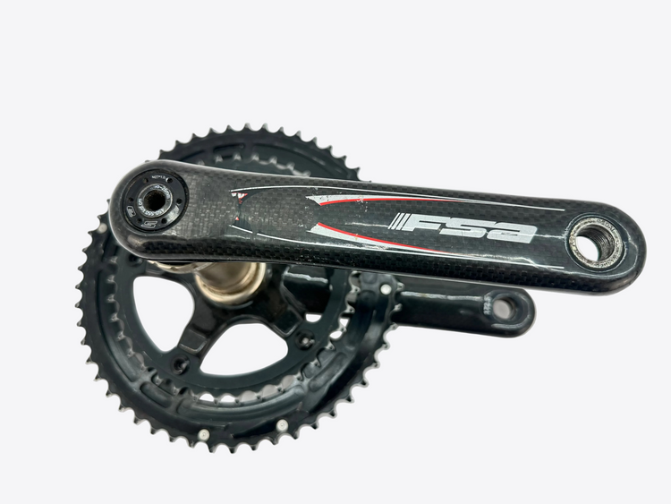 Bicycle crankset with chainring on a white background