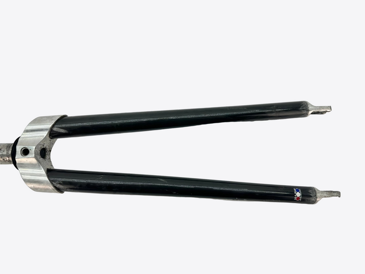Black bicycle fork with silver accents on a white background