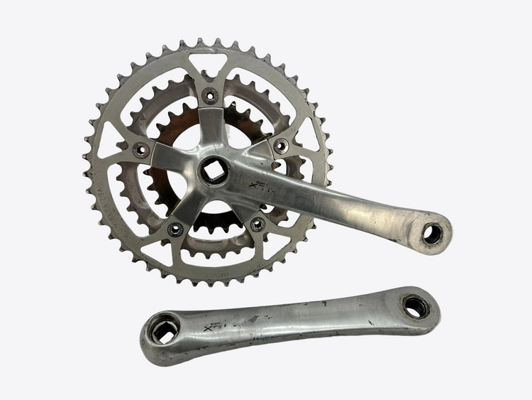 Bicycle crankset with chainring on a white background