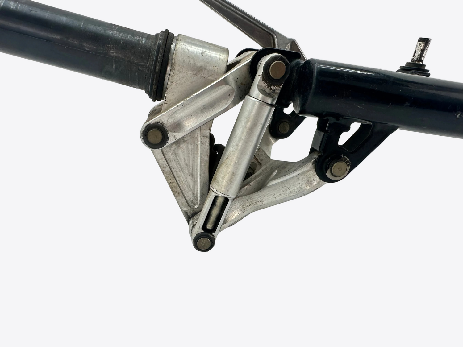 Close-up of a bicycle frame and suspension fork on a white background