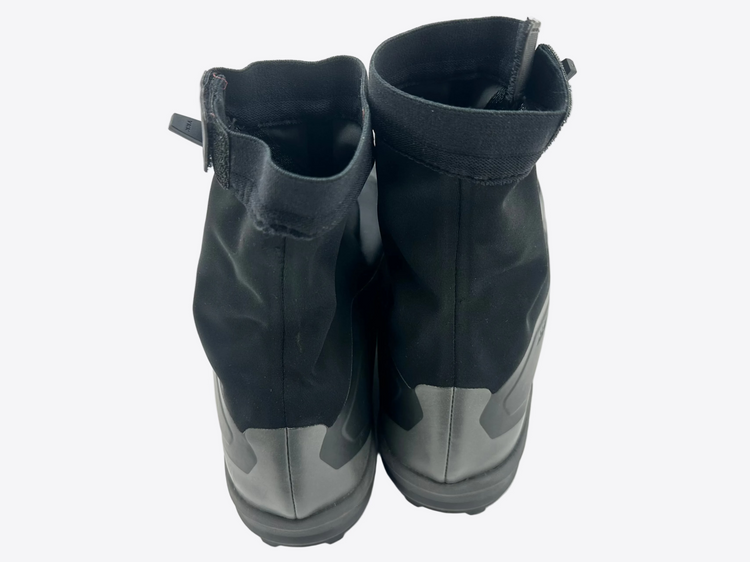 Pair of black and gray boots on a white background