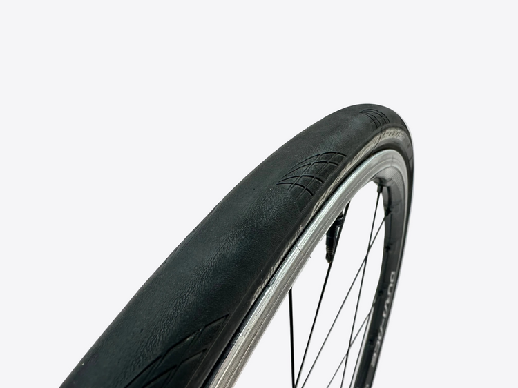 Close-up of a bicycle tire with a white background