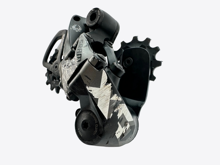 Close-up of a bicycle gear system on a white background