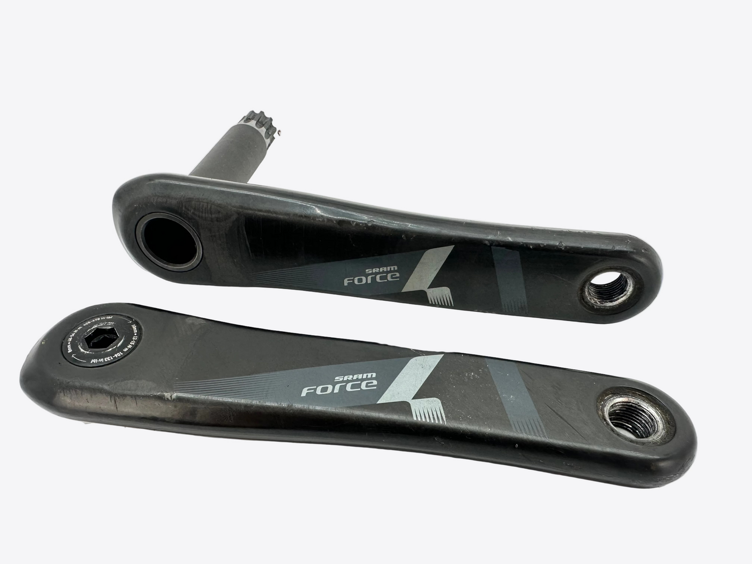 Two bicycle cranks with 'Shimano Force' branding on a white background
