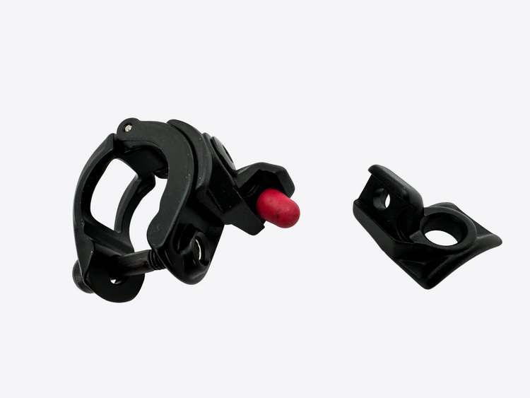 Black and red brake lever clamp on a white background