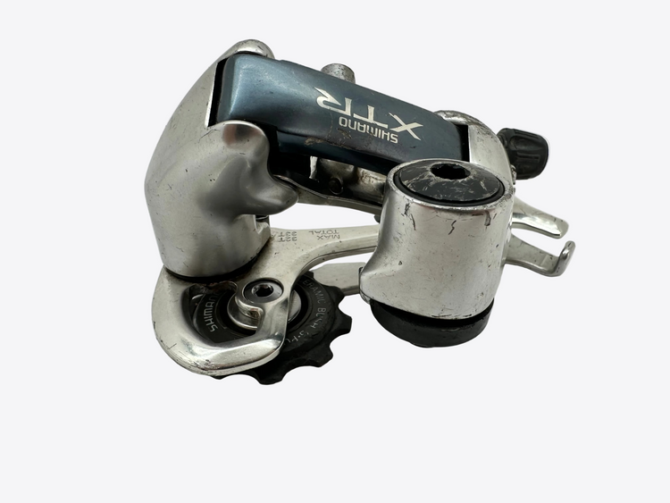 Bicycle derailleur with Shimano XTR branding on a white background