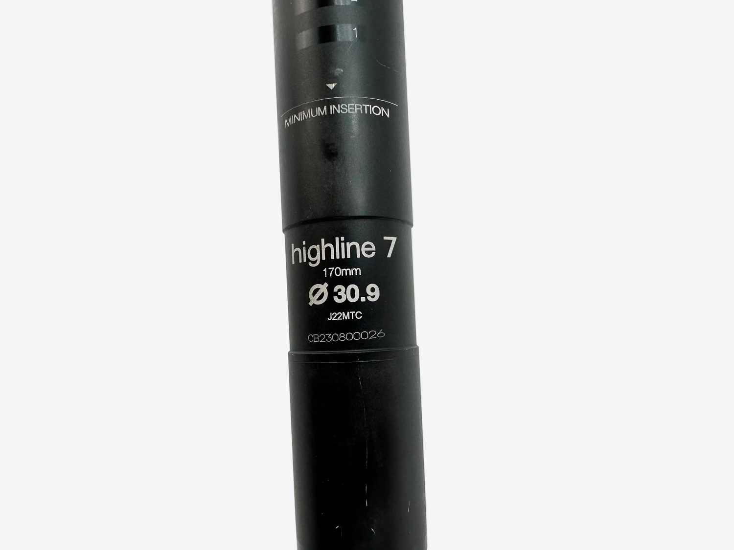 Black bicycle seatpost with 'Highline 7' branding on a white background