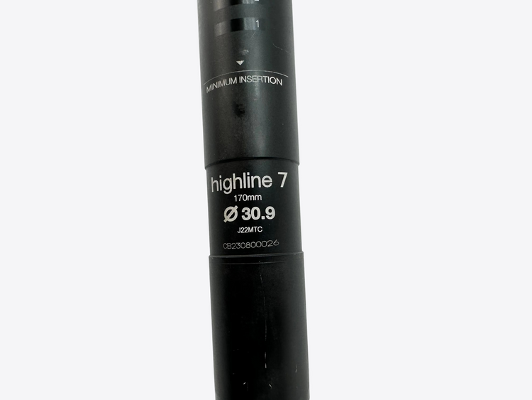 Black bicycle seatpost with 'Highline 7' branding on a white background