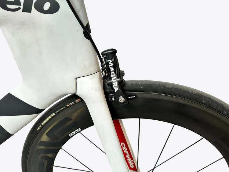 Close-up of a bicycle with Magura brake lever and Cervelo frame on a blurred background