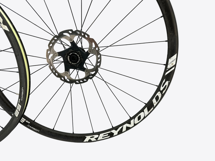 Bicycle wheel with Reynolds branding on a white background