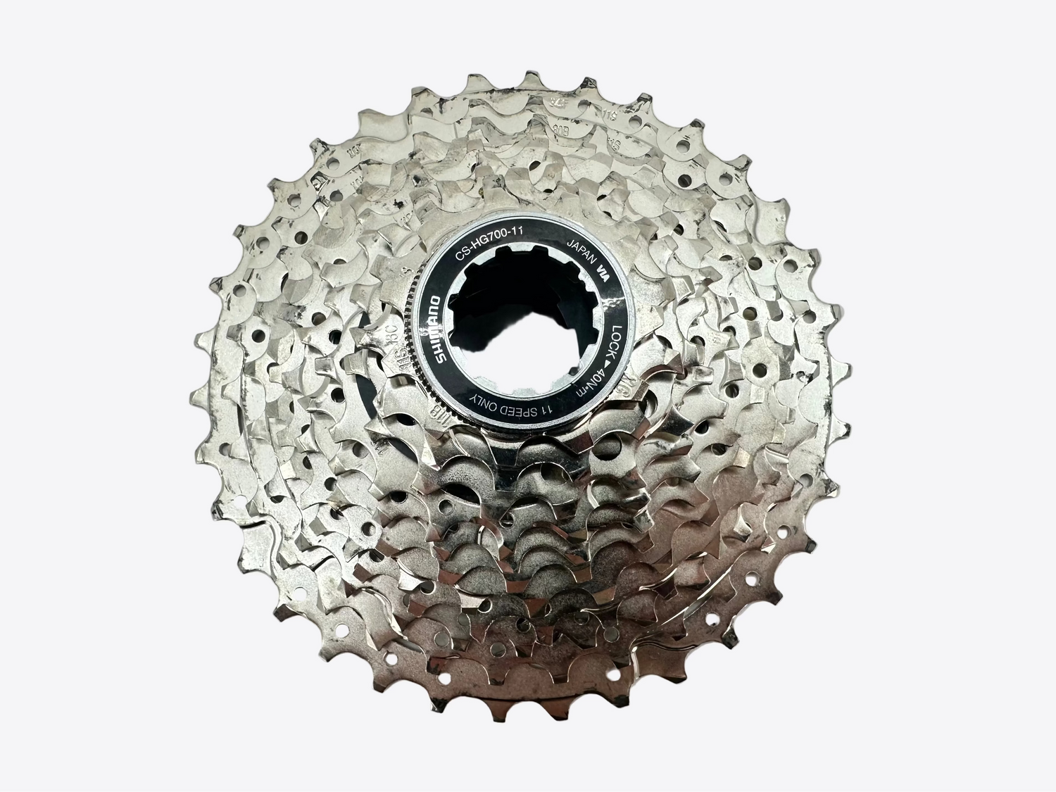 Bicycle gear cassette on a light gray background