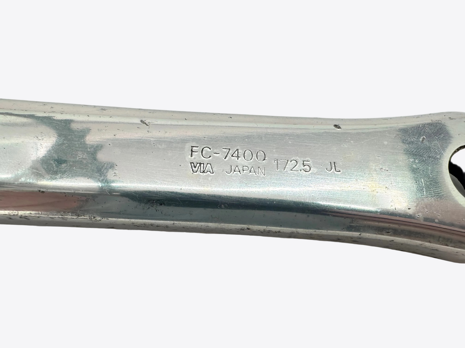 Crank arm with 'FC-7400' and 'JL' branding on a white background