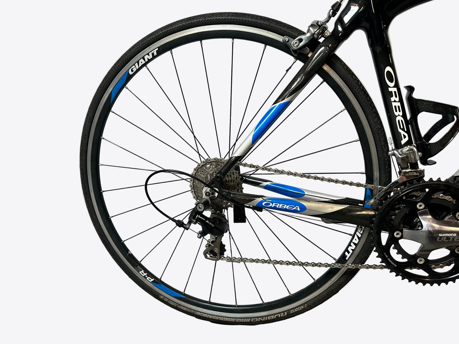 Close-up of a bicycle wheel with visible branding on a white background