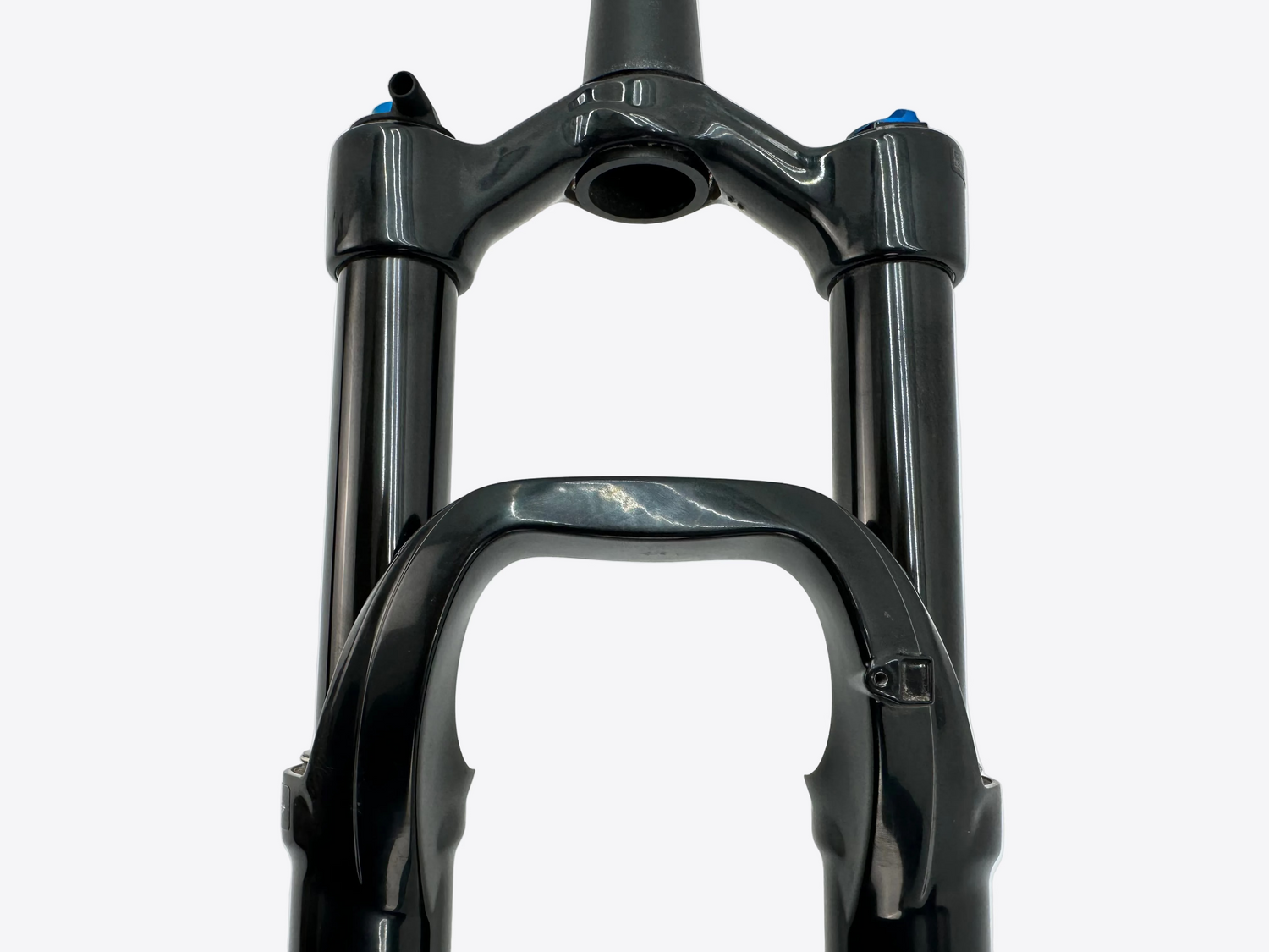 Close-up of a black bicycle fork on a white background