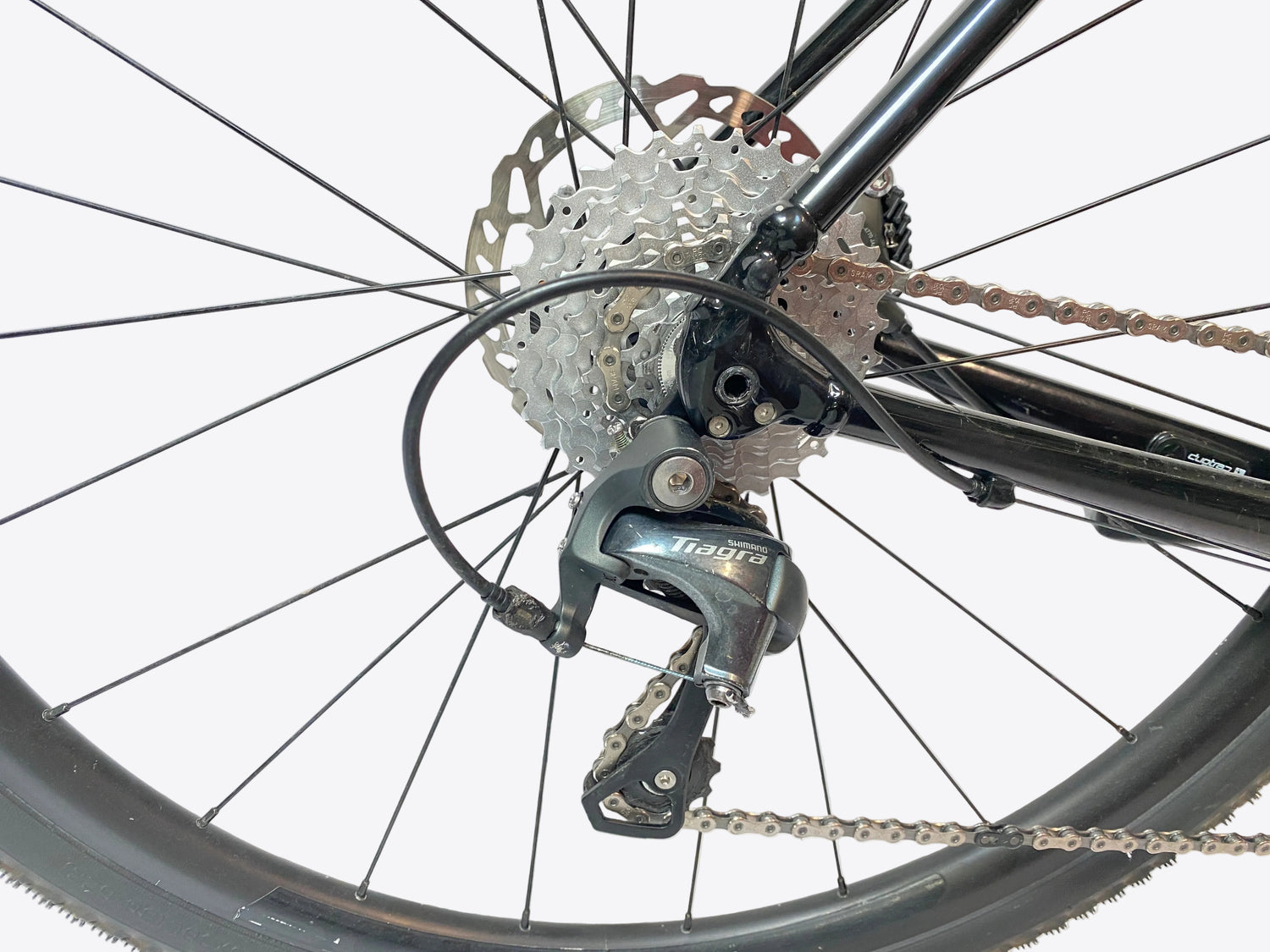 close up of the rear derailleur and cassette