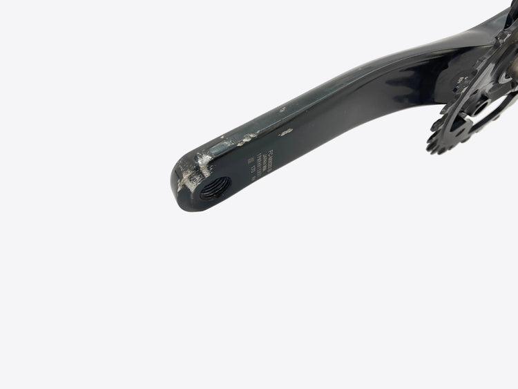 scratches behind the right crank arm